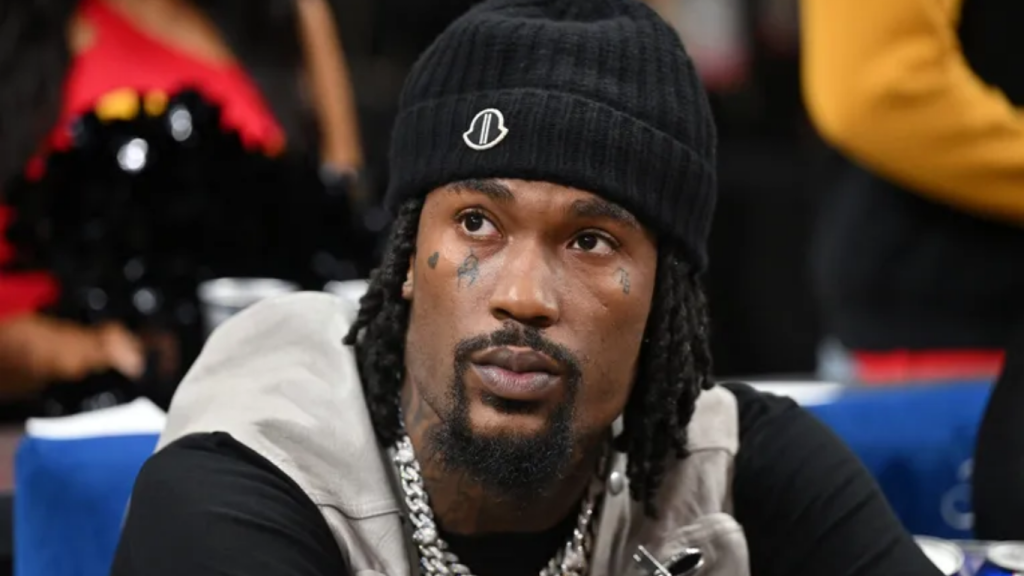 How Old is Hunxho, Hunxho rapper in 2026 wearing designer street fashion and diamond chains in Atlanta.